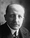 https://upload.wikimedia.org/wikipedia/commons/thumb/5/50/Georges_Theunis_1921.jpg/100px-Georges_Theunis_1921.jpg